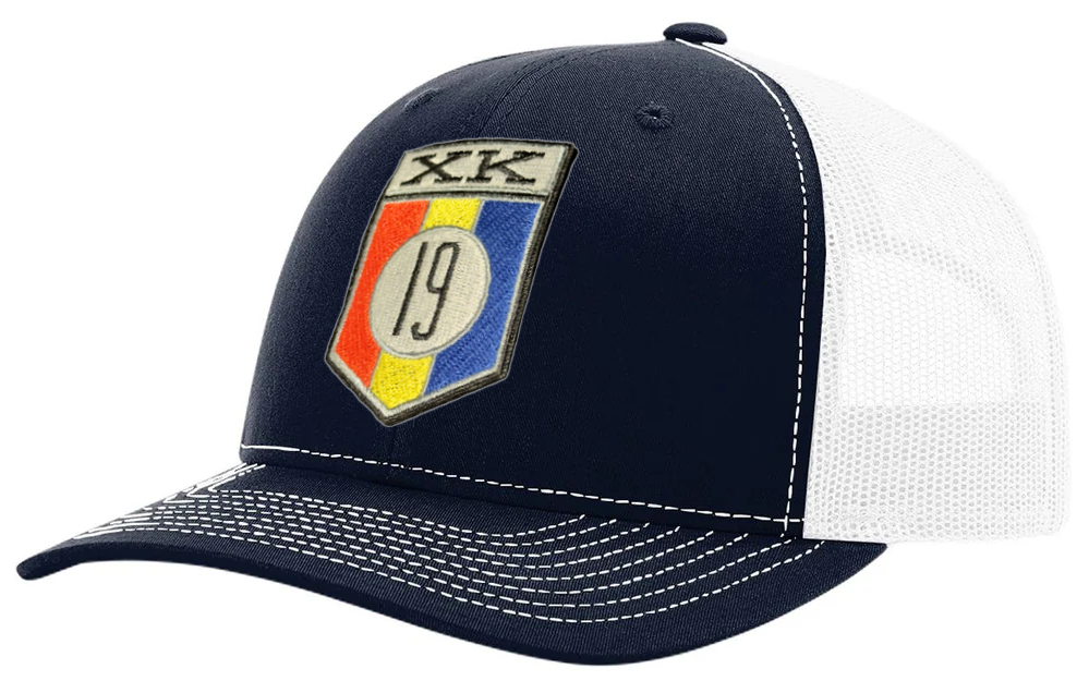 XK19 embroidered patch on a Richardson 112 Trucker style hat